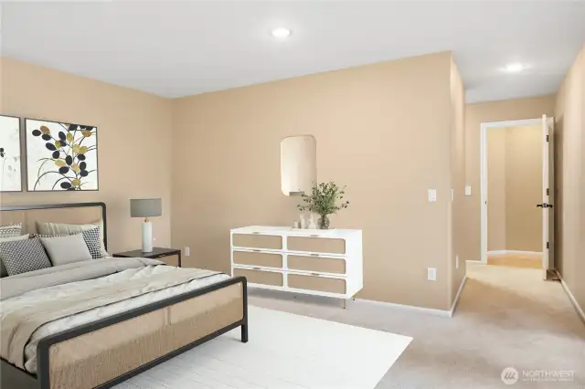 The primary ensuite has a huge walk-in closet, 6-piece bathroom and is privately located at one end of the home.