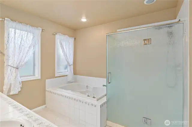 The shower was recently upgraded with new glass. The soaking tub is great for relaxing and unwinding.