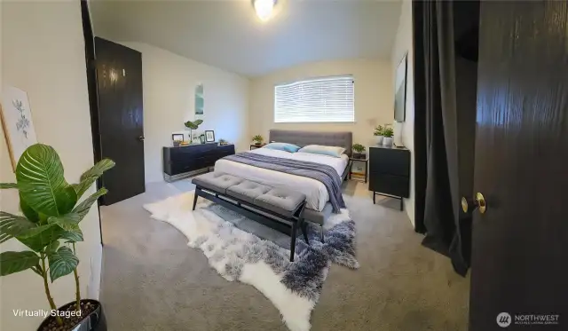 Virtually Staged photo of bedroom with connecting door to bathroom
