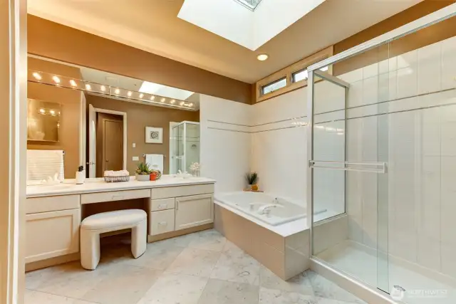 Luxurious 5 piece bath. Travertine tile, double vanity and jetted tub.