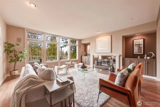 Generous sized living room, complete with gas fireplace and built in cabinetry for extra storage. Westerly views.