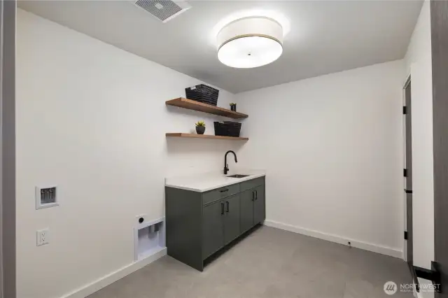 Spacious laundry room on second floor.