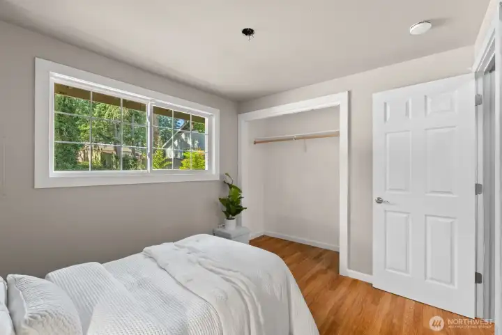 Closet doors and light fixture being installed