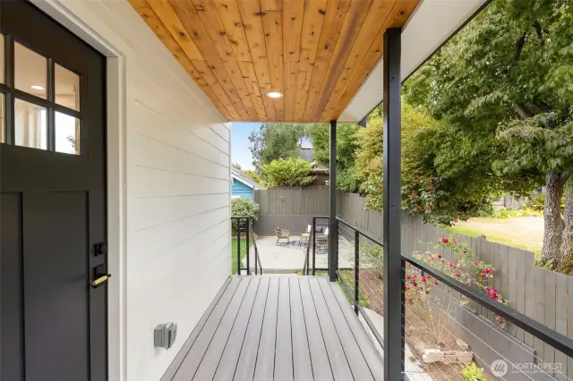 Enjoy coffee or cocktails on this charming private deck off the kitchen