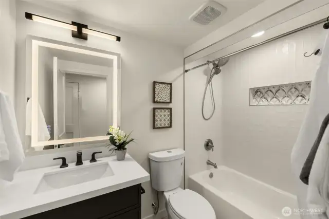 Crisp bathrooms showcase quality craftsmanship throughout the home.