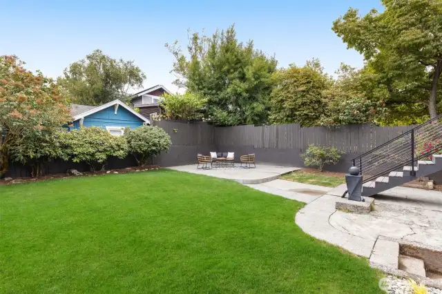 Lush yard—fully fenced for privacy, pets, and play.