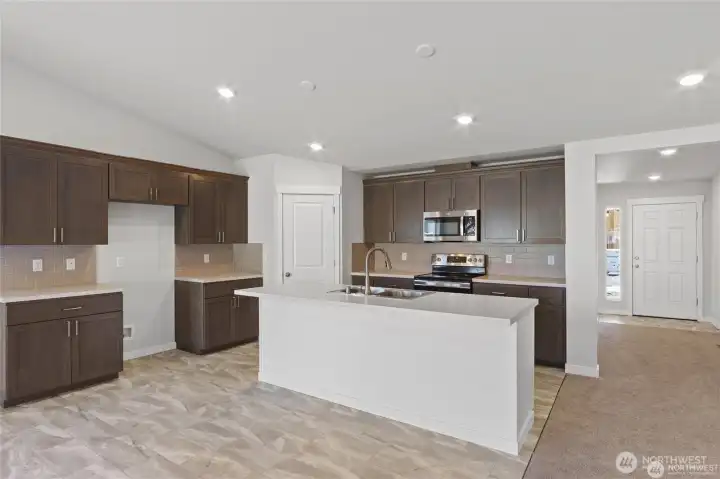 Kitchen area w/custom Cabinets