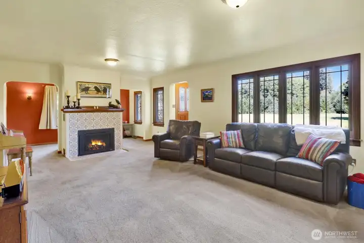 Inside find a lovingly maintained home with many original features including original hardwood flooring below the living room carpet