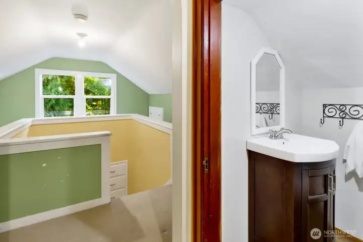 Upstairs has a conveniently located half-bathroom
