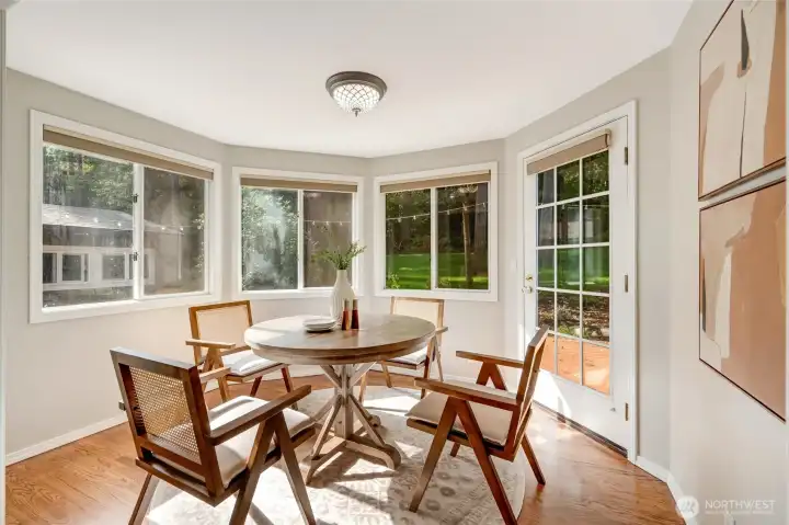 A generous breakfast nook offers the ideal spot to gather before the day begins.