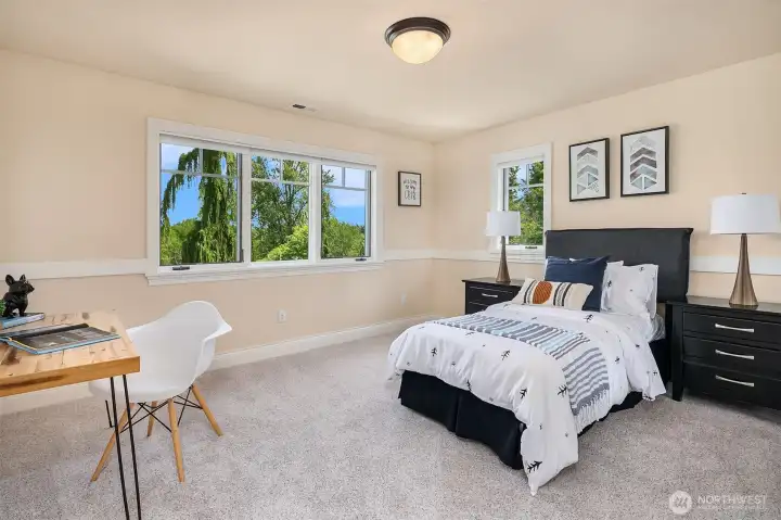 Oversized bedrooms with natural light tucked away in private wing from Primary