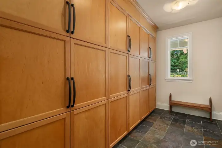 Built-in cubby/cabinetry in mud room area near garage.