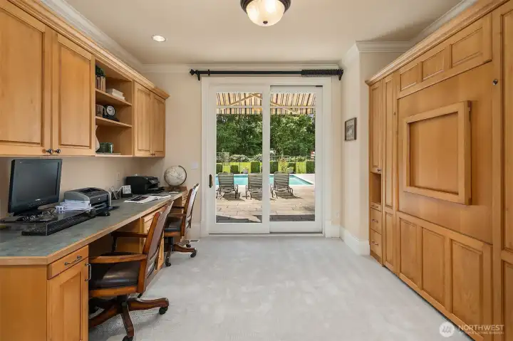 Additional main floor office with slider to pool area