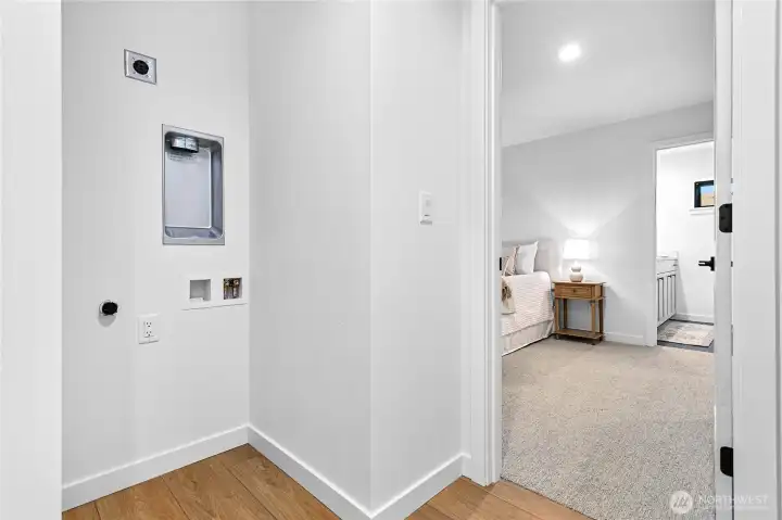 Stackable washer and dryer go here.