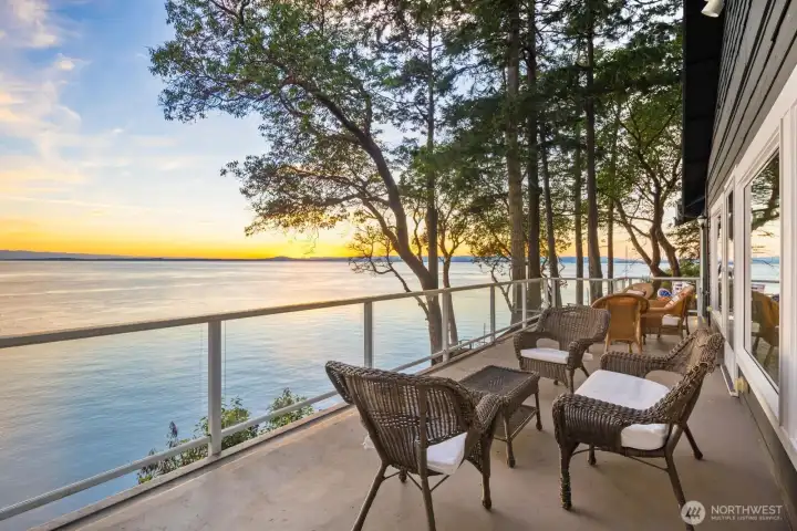 Expansive view deck perched above Smugglers Cove, offering front-row sunset vistas and seamless indoor-outdoor luxury living.