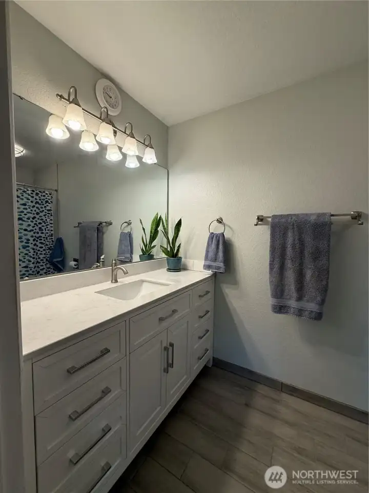 Primary bathroom with radiant heated flooring