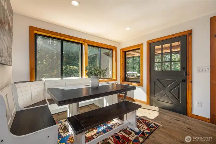 Dining space off the kitchen, with the deck through the door on the right.