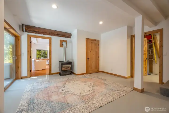 The spacious lower level has it's own entrance and offers a large rec room and plumbing access for a future kitchenette or bar, as well as a lower level bedroom suite.