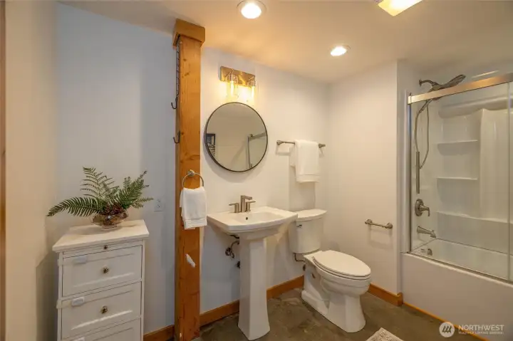 Ensuite bathroom off lower level bedroom.