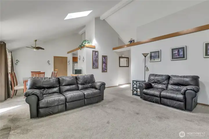 Generous living room with flexible layout and abundant natural light.