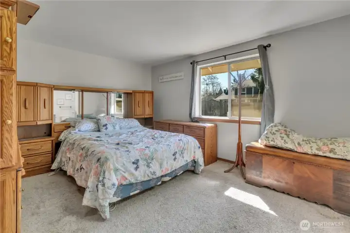 The spacious primary bedroom has it's own ensuite bathroom plus abundant natural light.