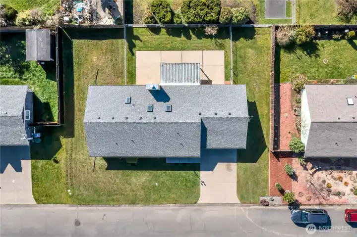 Top-down view of home footprint and yard configuration.