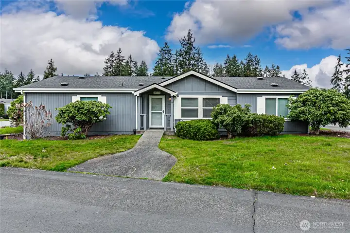 Sprawling triple wide on a corner lot