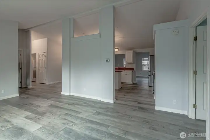 Formal living space looking into the kitchen.