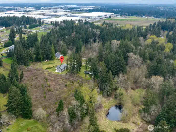 Expansive 1-acre lot offering a quiet, rural feel with frequent deer sightings and plenty of room to breathe but still an easy drive to local services and amenities.