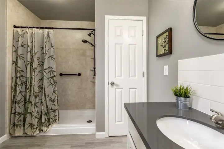 The private inner bathroom includes a second vanity, a large shower, and a high-end Toto toilet for ultimate efficiency and comfort