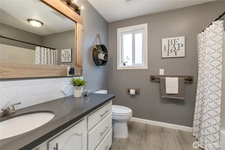 Consistent quality throughout, including a second full bathroom on the main floor equipped with premium fixtures