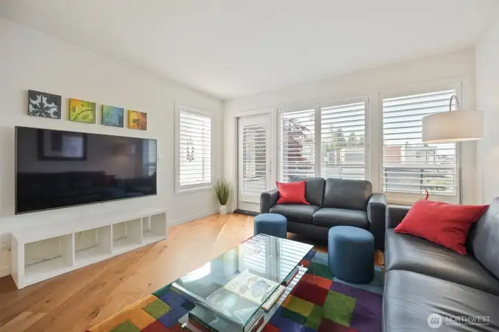Sunlit living room designed for relaxing and entertaining.