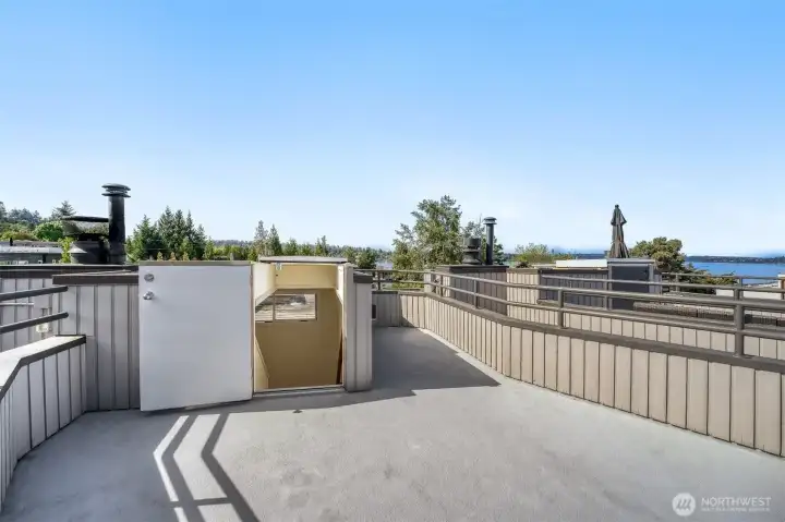 Private rooftop deck with breathtaking Lake Washington views.