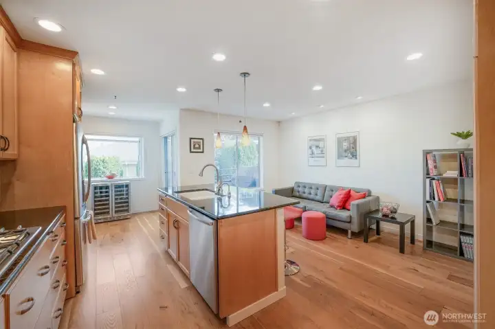 Open kitchen layout encourages gathering and conversation.