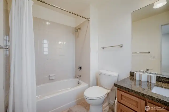 Private bath enhances comfort and functionality.