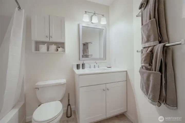Beautifully refreshed bath with modern appeal.