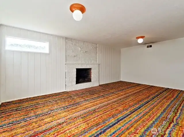 Lower level Rec Room with fireplace