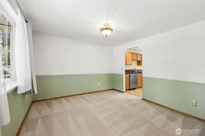 Another view of the dining room just off the entry looking back into the kitchen.
