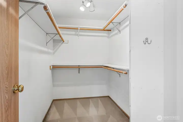 One of the two walk-in closets for the primary suite.