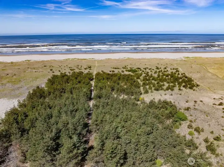 1.63 Acres, 100ft width Mean High Tide. Pathway is the north border of this amazing property.