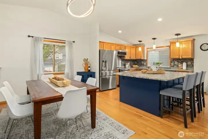 Spacious kitchen and dining area with an oversized island with tons of storage. State of the art stainless steel applicances too!