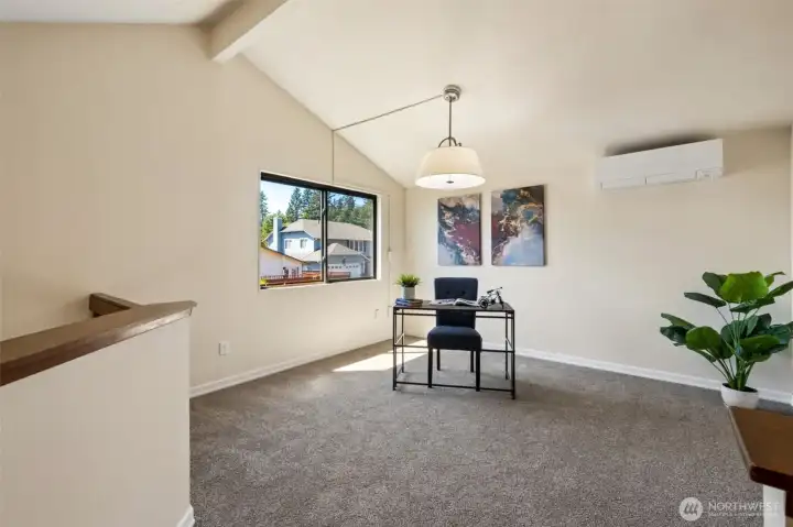 The lofted bonus area provides flexible living space ideal for today's lifestyle—whether working from home, pursuing hobbies, or creating a cozy reading nook