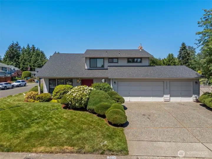 Coveted 970-square-foot 3-car garage offers exceptional space for vehicles, storage, hobbies, projects, and a dedicated workshop area.