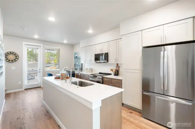 Photos are of community model home in a similar plan.