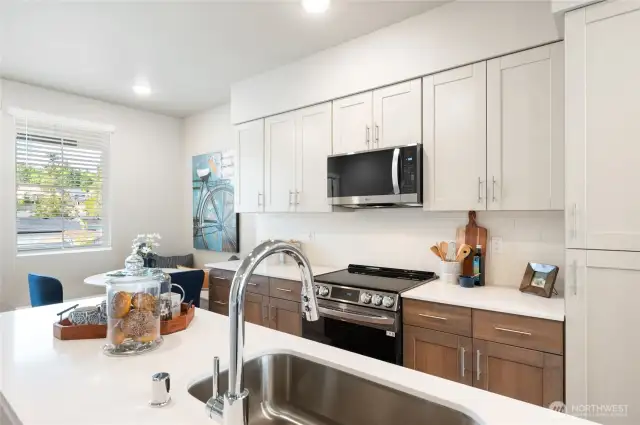 Photos are of community model home in a similar plan.