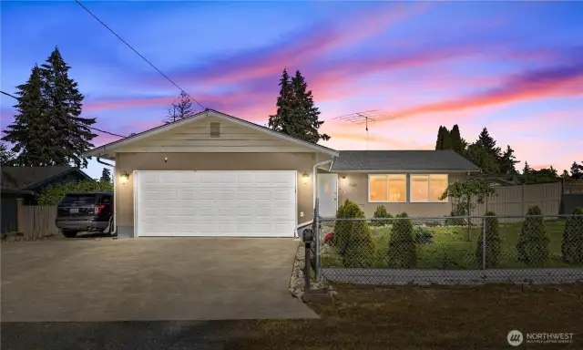 Charming rambler with great curb appeal. Features a two-car garage, even more drive way space, fully fenced yard, and clean landscaping.