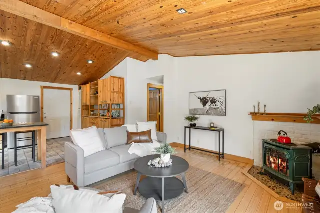 French doors lead you into a great room with vautled wood ceilings!