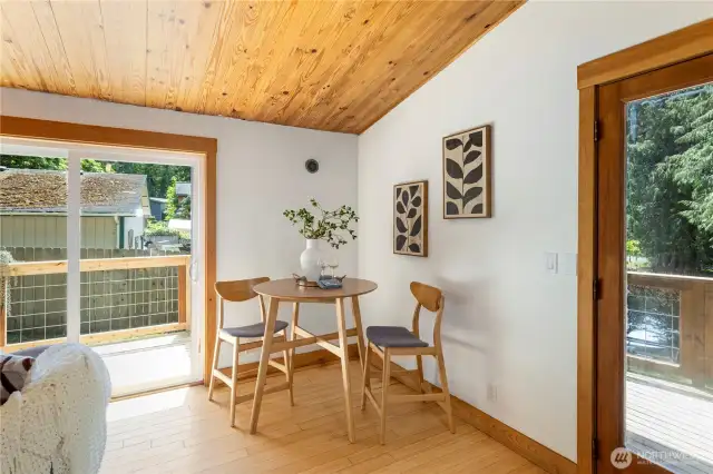 Double French doors lead to a large front deck  and a slider leads to deck #2 of 3!