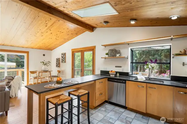 Vaulted ceilings, skylight and garden window above kitchen sink...SO. MUCH. NATURAL LIGHT!