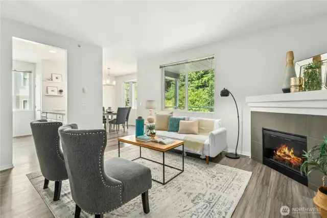 Open concept living with windows throughout maximizing natural light.